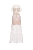 Elegant white Joséphine Stella gown with flowing fabric and detailed neckline, perfect for formal occasions.