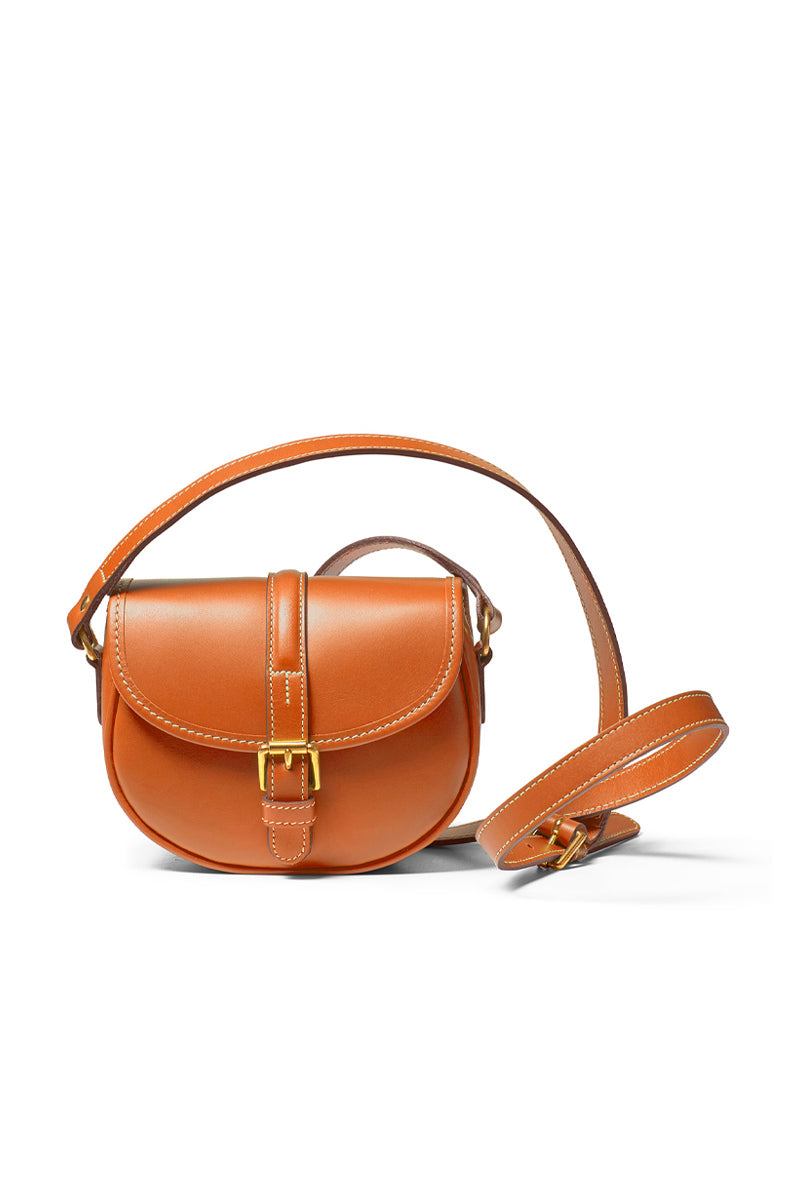 TUSTING Cardington tan shoulder bag with adjustable strap and sleek design, made from durable material.