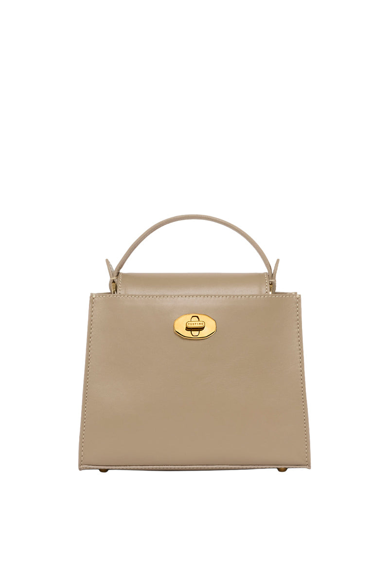 Taupe TUSTING Clara top handle bag with sleek design, featuring a structured shape and stylish handle for versatile carry.