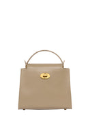 Tusting Clara taupe top handle bag with structured design and leather strap, featuring a sleek, minimalist style.