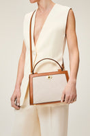 TUSTING Clara Grande in Como canvas top handle bag with tan trim, featuring structured design and sturdy handles.
