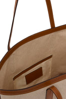 TUSTING COMO TOTE shoulder bag in crumpled leather with top handles and spacious interior, stylishly displayed.