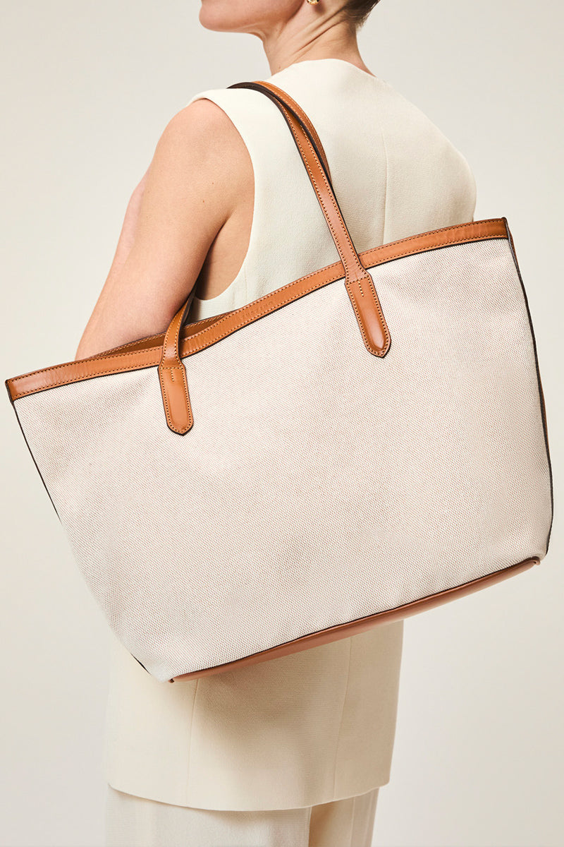 TUSTING COMO TOTE shoulder bag in cream with leather accents, featuring dual top handles and spacious interior for everyday use.