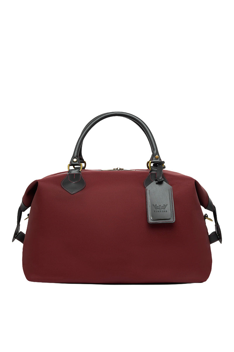 Black TUSTING Superlight Explorer medium top handle bag with sleek design and sturdy handles, ideal for everyday use.