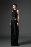 Black Jambari tulle ruffles top and Majmat crepe straight pants co-ords by 21Six, featuring ruffle details and a sleek, fitted silhouette.