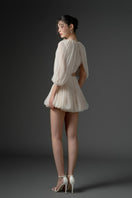 Beige silk cut-out mini dress by 21Six featuring a stylish, modern design with a fitted silhouette and elegant detailing.