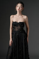 Black GHAZAL lace strappy midi dress by 21Six, featuring delicate lace details and a fitted silhouette.