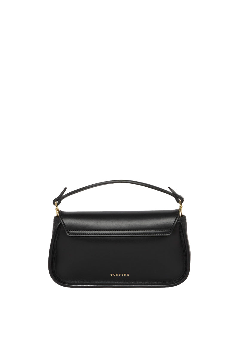 Black TUSTING HETTIE clutch bag with sleek design and gold-tone accents, featuring a compact, stylish accessory for evening events.