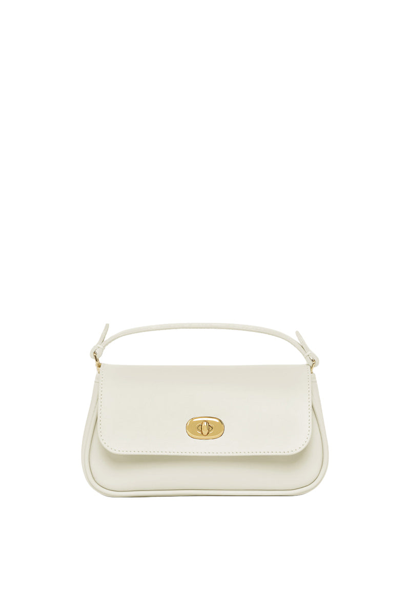 Light blue TUSTING HETTIE clutch in cloud design with a sleek, compact shape and textured surface.