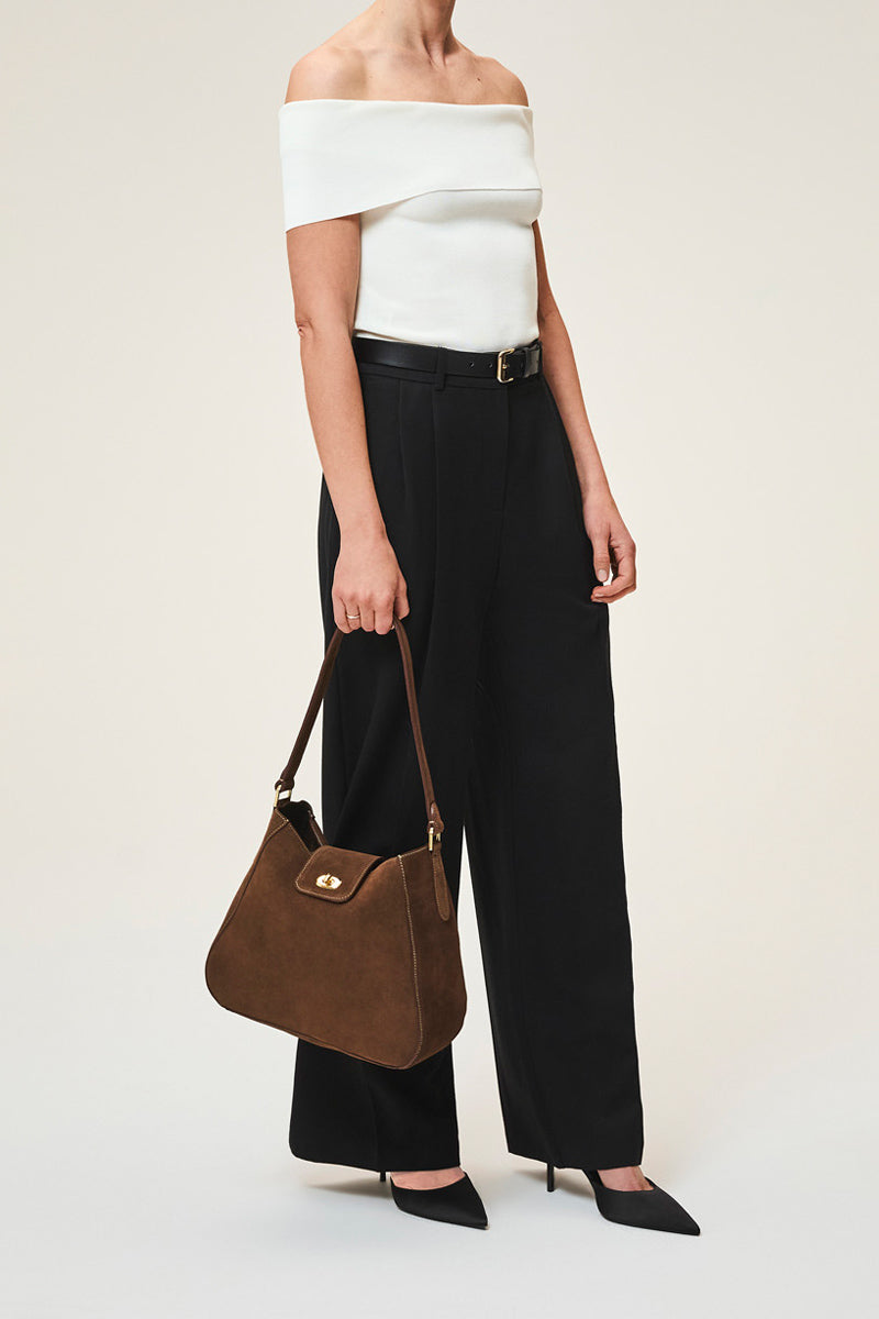 TUSTING Hazel chocolate suede shoulder bag with adjustable strap and minimalist design, featuring a sleek, modern look.