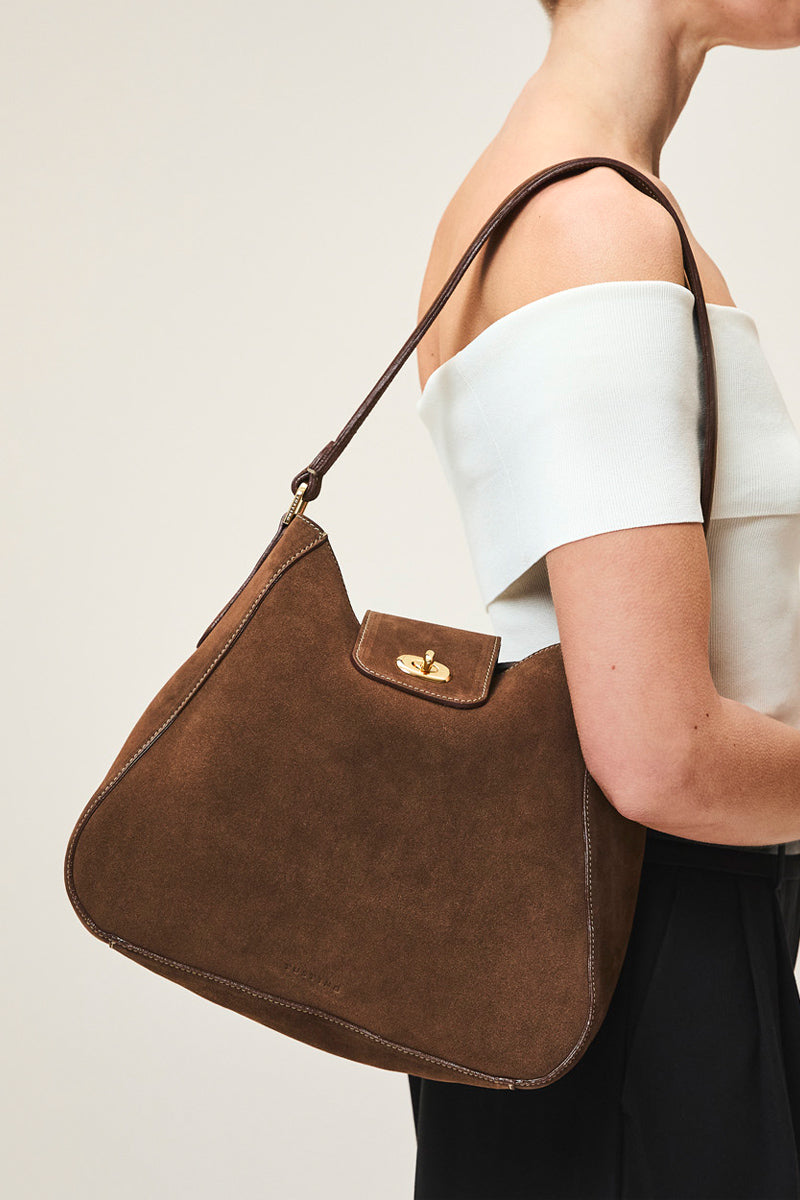 Tusting Hazel in Chocolate Suede shoulder bag with sleek design and adjustable strap, crafted from soft suede material.