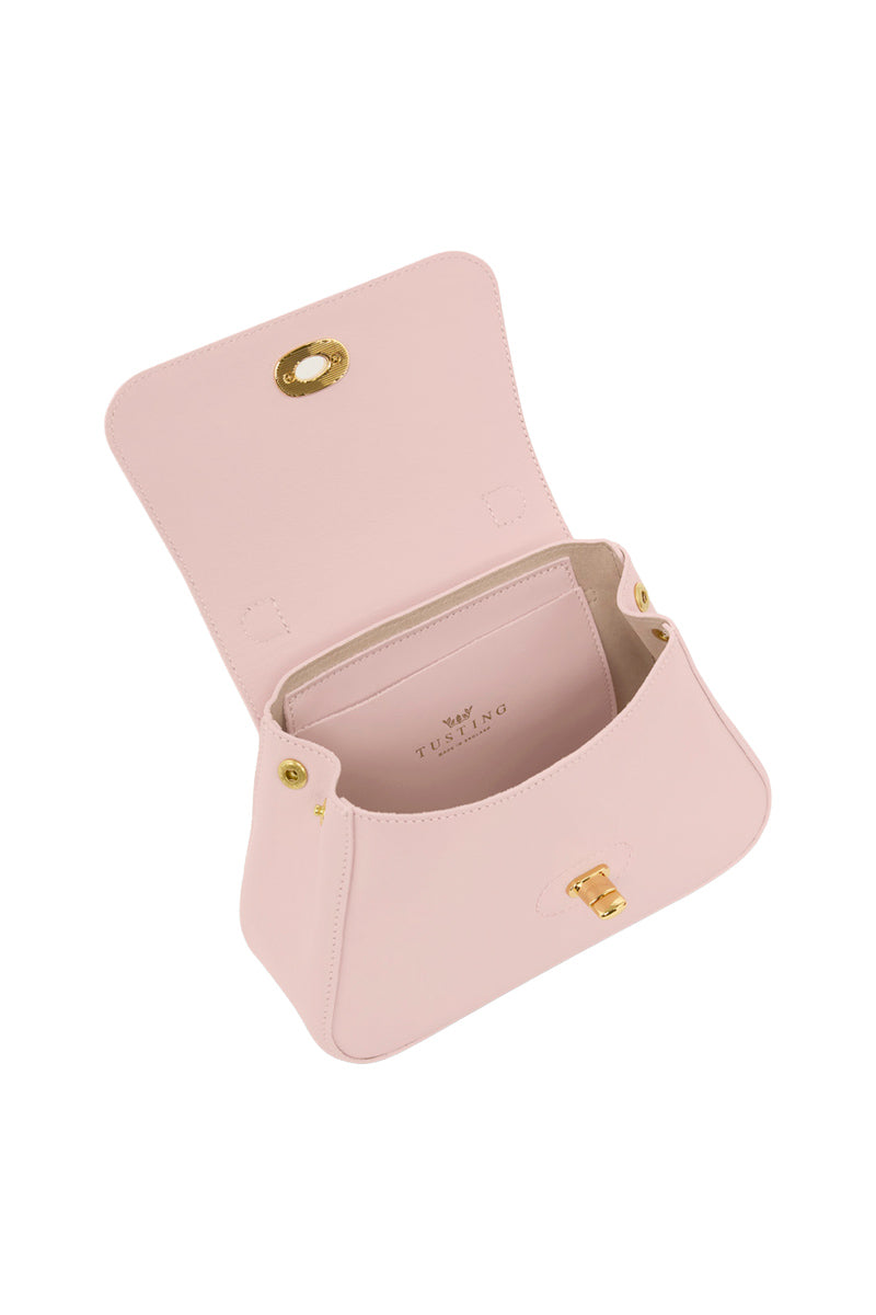 Mini Holly in Blossom top handle bag by TUSTING, featuring a stylish blossom design with a top handle and compact shape.