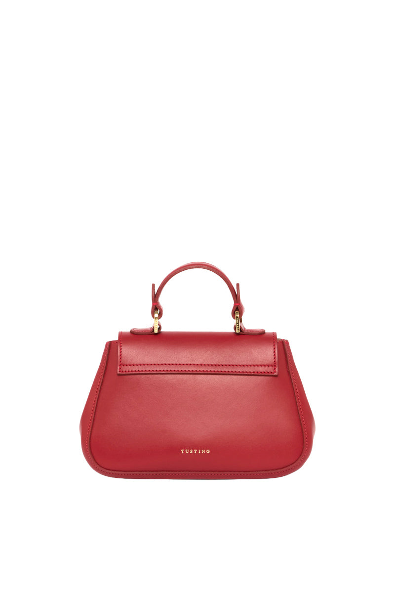 TUSTING MINI HOLLY top handle bag in crimson leather with gold-tone hardware and compact design.