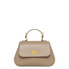 Mini Holly taupe top handle bag by TUSTING, showing its compact design and elegant taupe leather finish.
