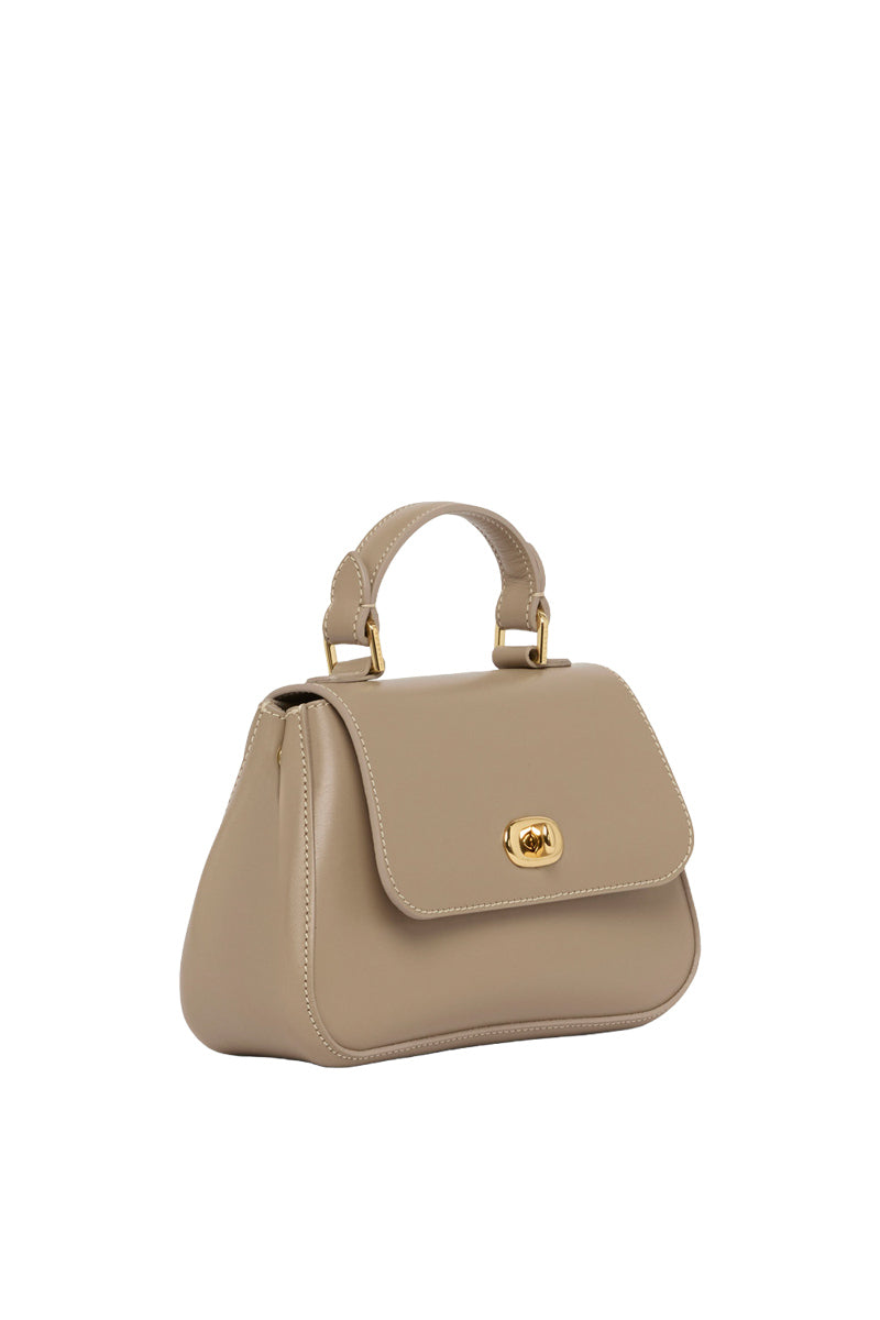 Taupe mini Holly top handle bag by Tusting with sleek design and elegant handles, perfect for stylish everyday use.