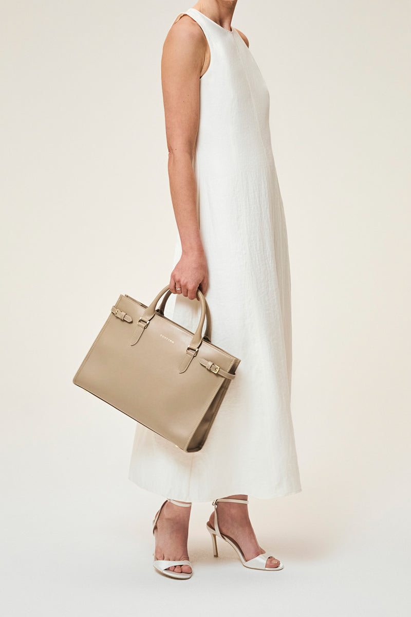 Taupe TUSTING KIMBOLTON top handle bag with structured design and sleek handles, stylish accessory for everyday use.