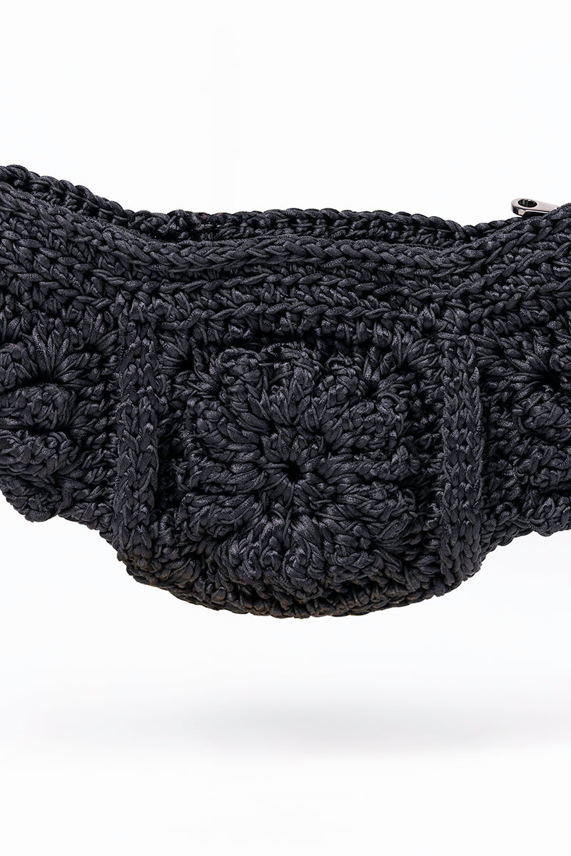 Black Mara Brazil Tulipa shoulder bag with sleek design, featuring a structured shape and stylish strap.