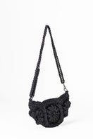Black Mara Brazil Tulipa shoulder bag with stylish design and adjustable strap, shown on a plain background.