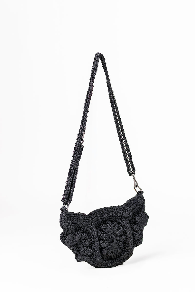 Black Mara Brazil Tulipa shoulder bag with stylish design and adjustable strap, shown on a plain background.
