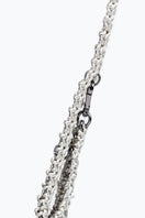 Silver Mara Brazil Tulipa shoulder bag with sleek design and adjustable strap, featuring a stylish and versatile accessory.