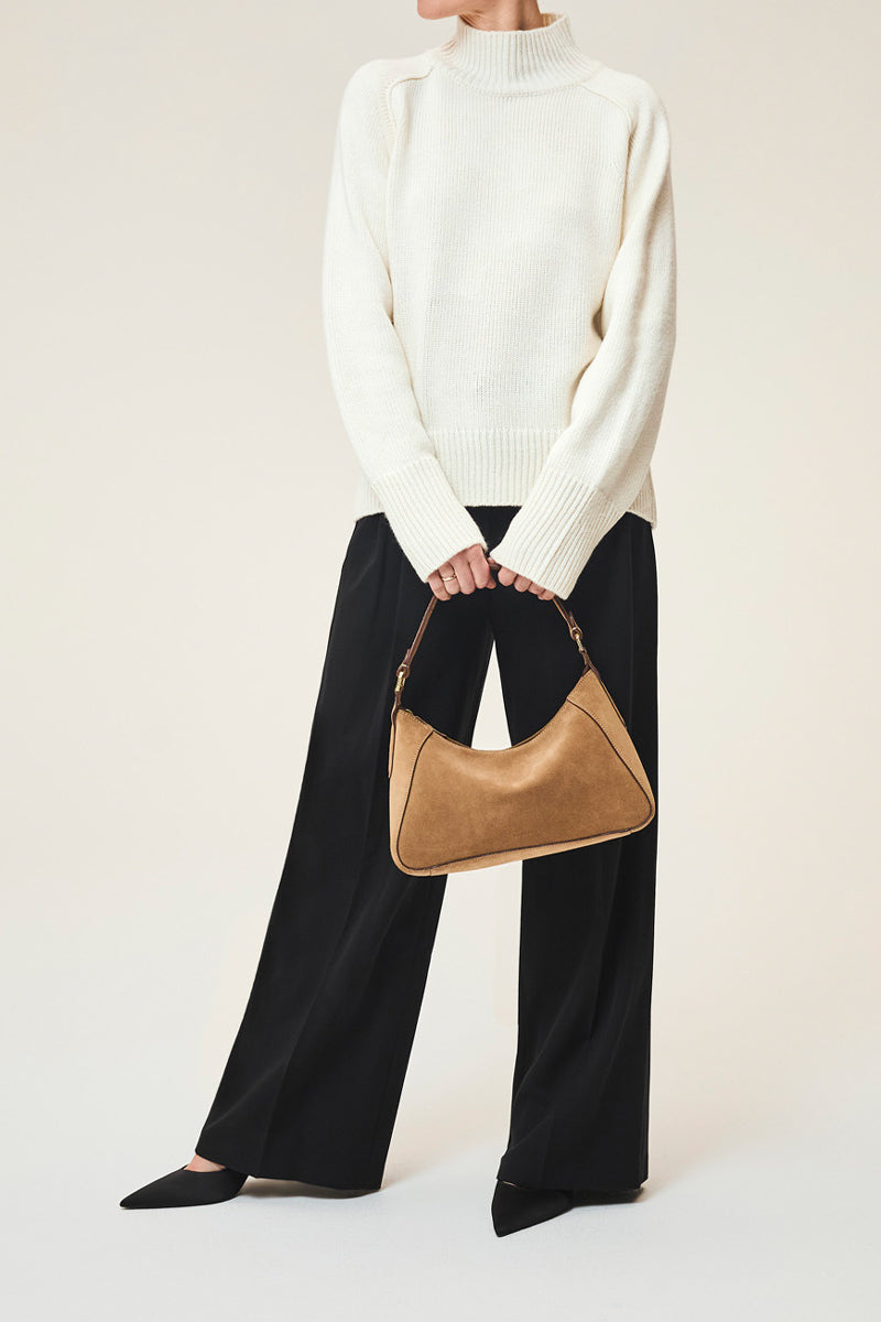 TUSTING Sienna in Date top handle bag featuring a structured design and elegant leather finish.