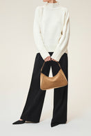 TUSTING Sienna in Date top handle bag with structured design and top leather handle, elegant accessory for stylish outfits.
