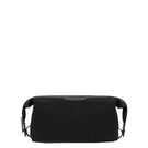 TUSTING Horizon clutch bag in Como canvas with black leather trim, featuring a sleek, modern design with a zipper closure.