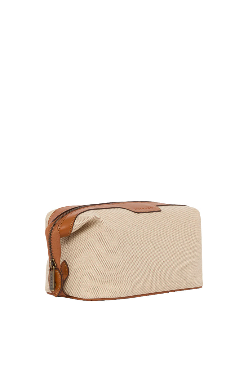 TUSTING Horizon canvas and leather top handle bag in Como canvas with tan trim, featuring a structured design and top handle.