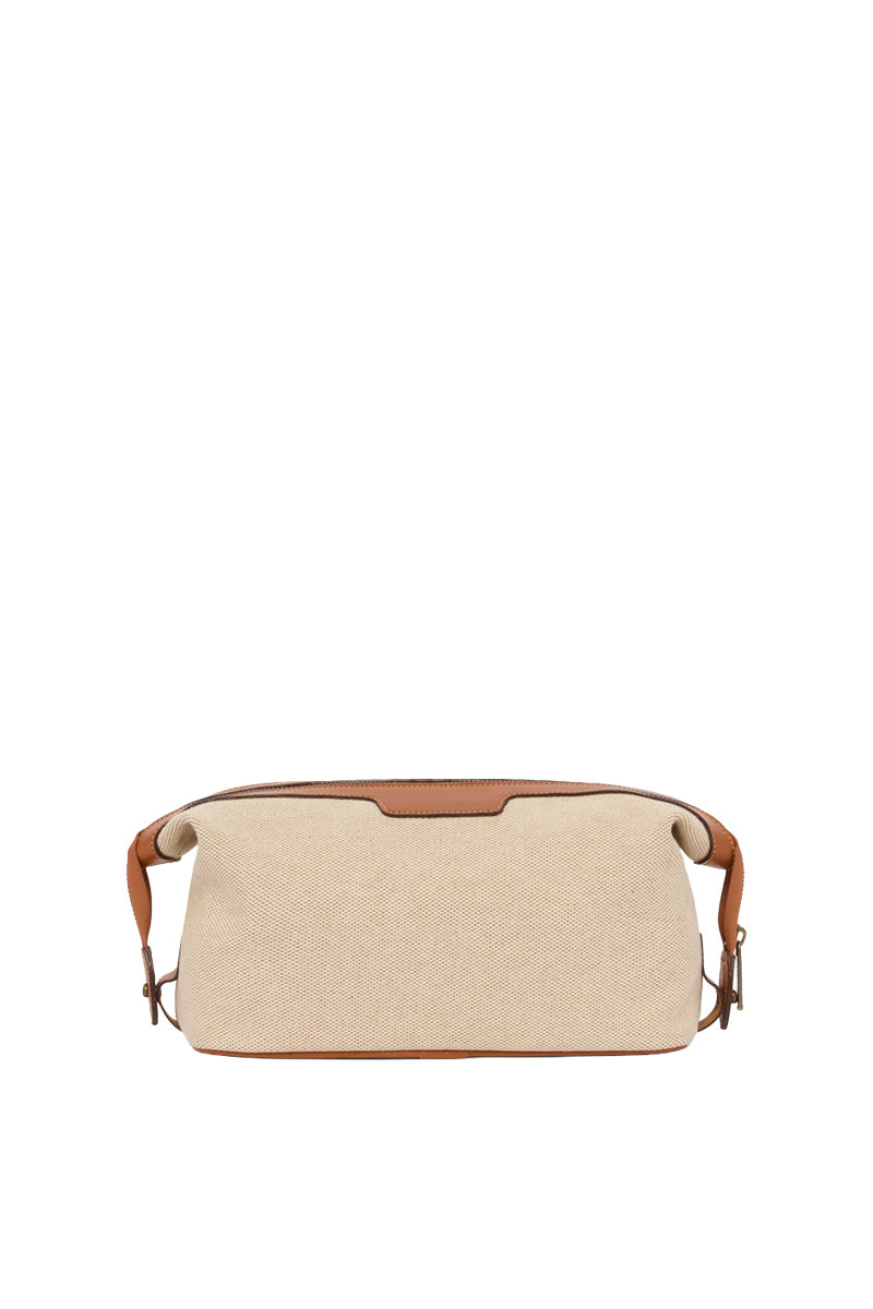 TUSTING Horizon canvas and leather top handle bag in Como canvas with tan trim, featuring a structured design and top handle.