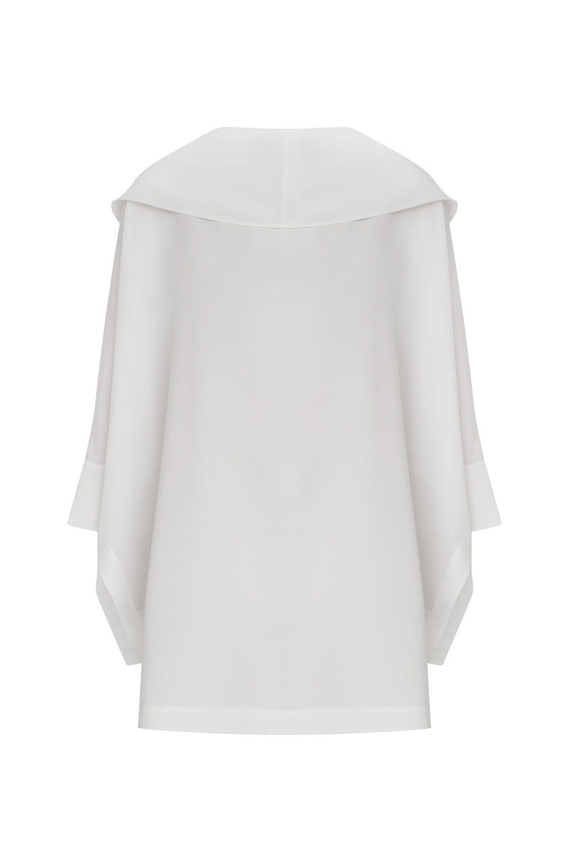 Tagg two-side wearable blouse, versatile tops with front and back design, shown in the image with stylish fabric and modern cut.
