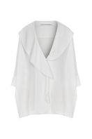 Two-sided wearable blouse by TAGG, showcasing front and back views of a stylish women's tops design.