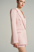Light pink double-breasted blazer in taffeta fabric from I.H.F Studio, shown in an oversized fit.