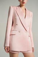 Light pink double-breasted blazer by I.H.F Studio featuring oversized fit and taffeta fabric, shown on a model.