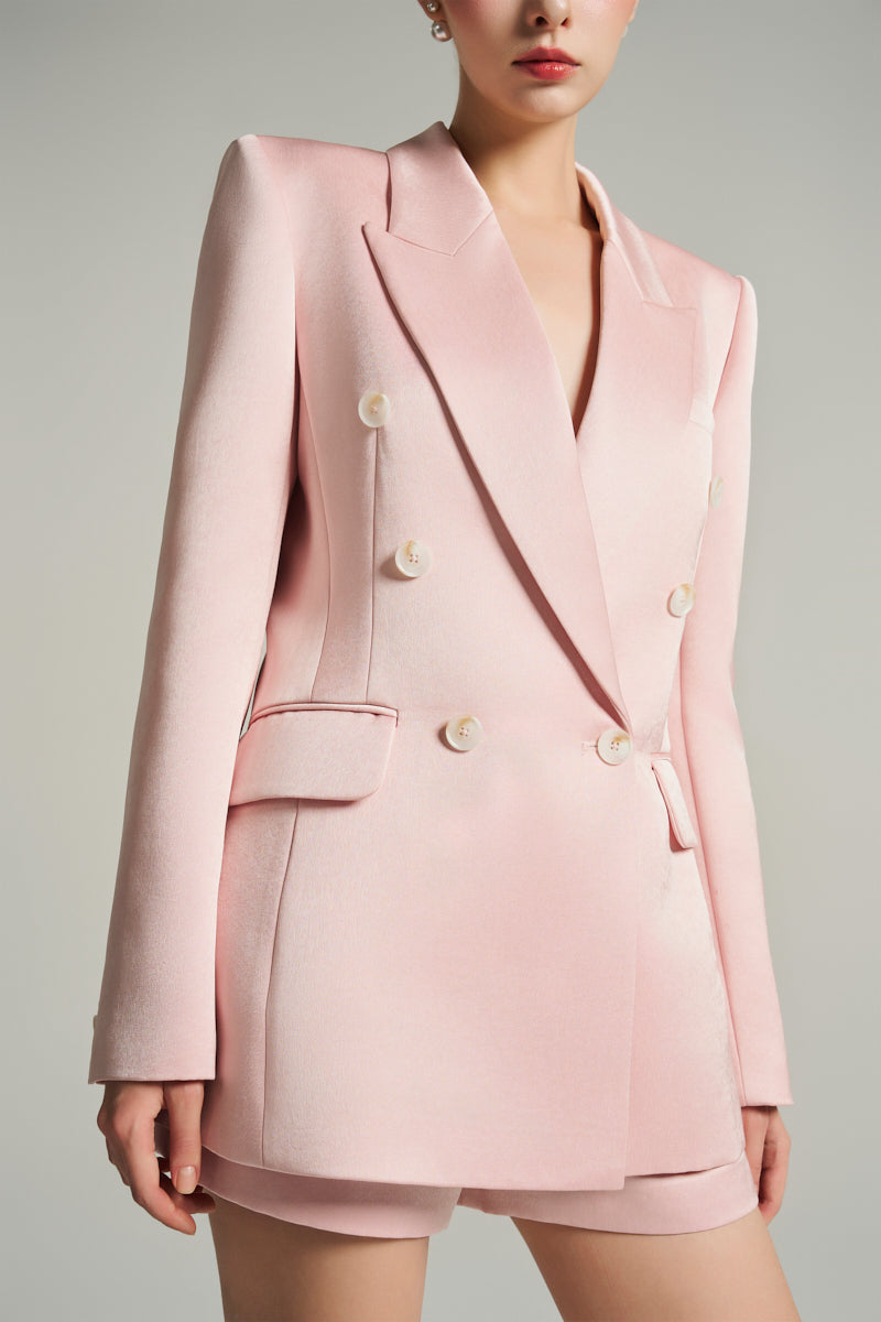 Light pink double-breasted blazer by I.H.F Studio featuring oversized fit and taffeta fabric, shown on a model.