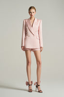 Light pink double-breasted blazer from I.H.F Studio, featuring a tailored fit and classic lapel design.