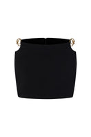 Black Tallulah mini skirt by Nana Jacqueline featuring ring cutout design, shown from the front.