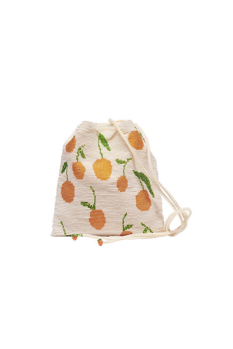 Beige Pura Utz shoulder bag with a tangerine pouch design, featuring a sleek and stylish accessory for casual or chic outfits.