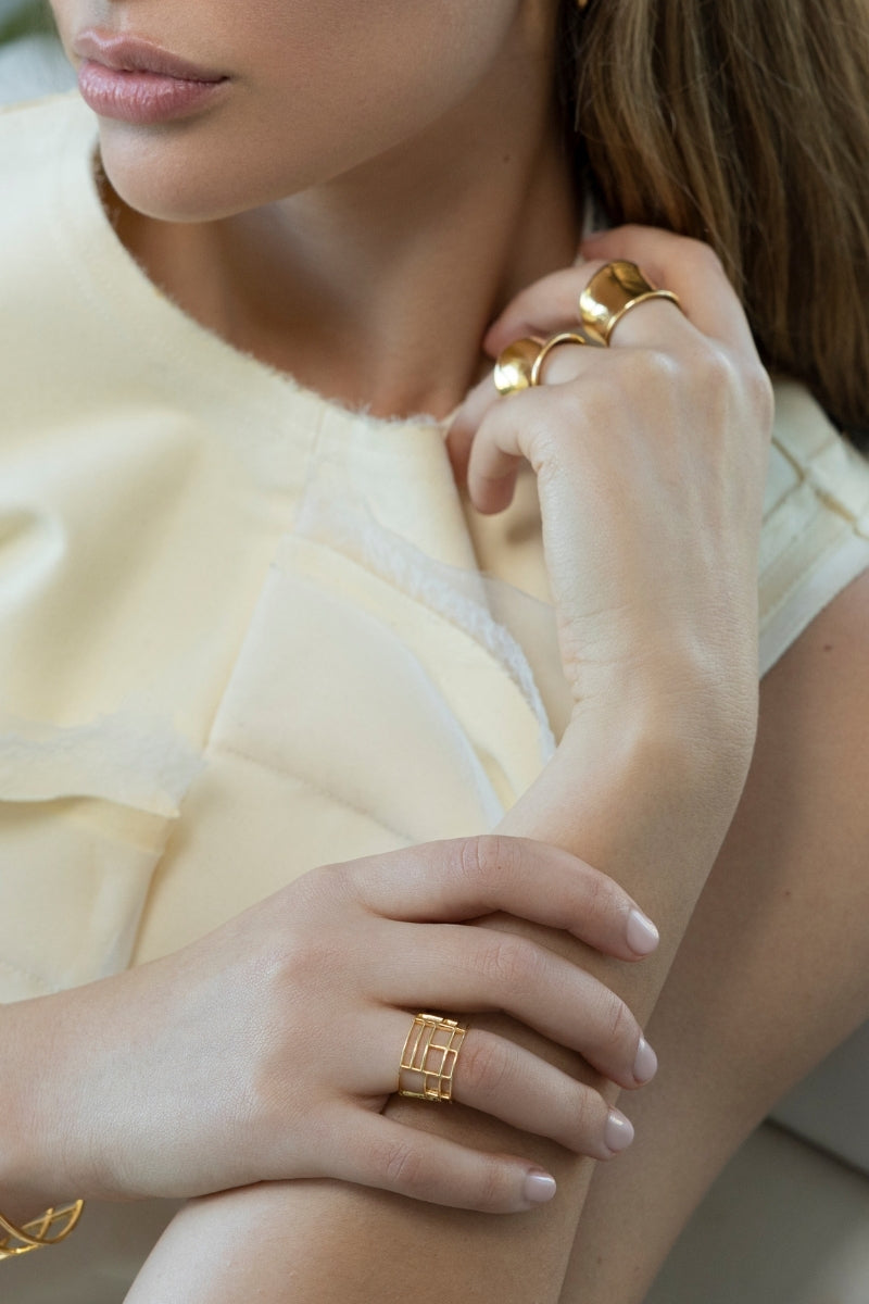 Yellow gold vermeil tape ring by Sara Shala, featuring a sleek, modern design with a smooth, polished finish.