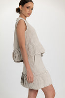 Light beige TATTI top by ANA + MARIA, featuring a stylish sleeveless design and lightweight fabric, perfect for casual wear.