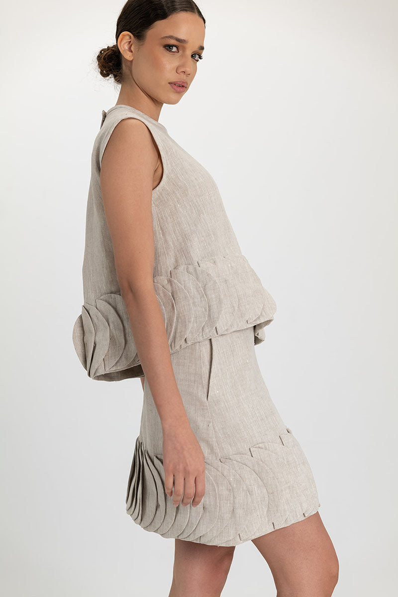 Light beige TATTI top by ANA + MARIA, featuring a stylish sleeveless design and lightweight fabric, perfect for casual wear.