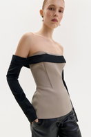 ELENAREVA taupe corset top with black long sleeves, fitted design, and stylish contrasting color combination.