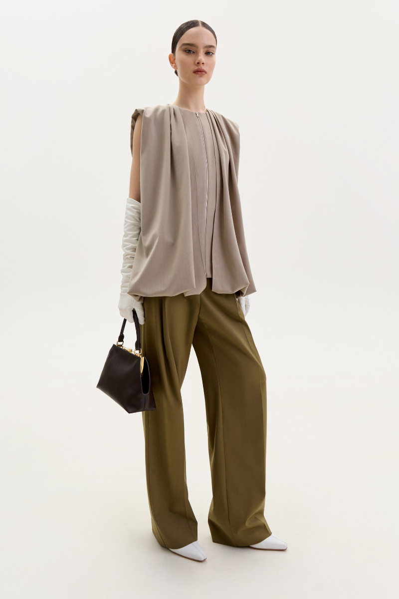 Taupe ELENAREVA vest with front zipper and belt, featuring a stylish, fitted design perfect for casual or smart outfits.