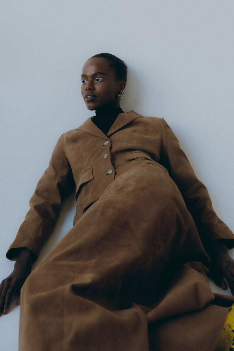 ZUT Taylor jacket in tan, stylish men's jacket with a sleek design and zip closure, shown on a model.