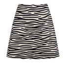 ZUT Taylor mini skirt in thin zebra print, showcasing a stylish and fitted design with bold black and white zebra pattern fabric.