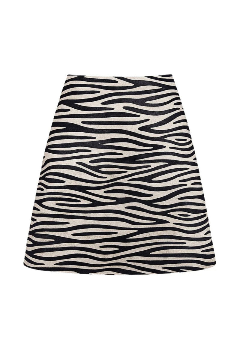 ZUT Taylor mini skirt in thin zebra print, stylish high-waisted design with black and white zebra pattern fabric.