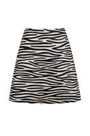 ZUT Taylor mini skirt in thin zebra print, showcasing a stylish and fitted design with bold black and white zebra pattern fabric.
