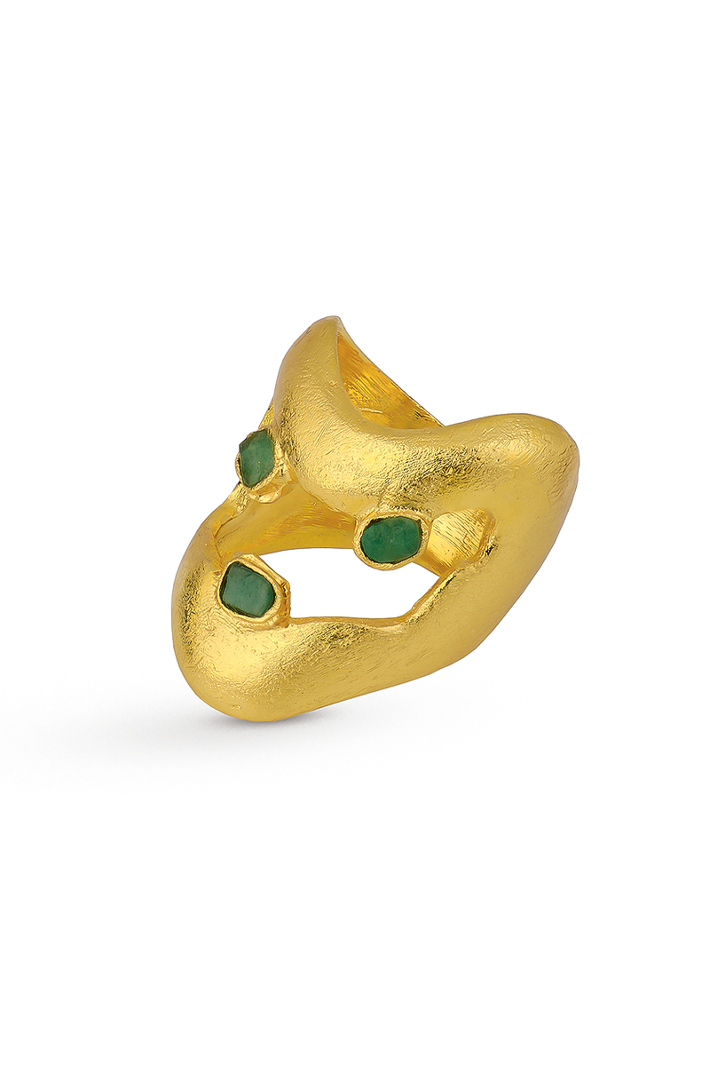 Gold TENA EMERALD RING by Fenomena featuring a central emerald gemstone set in an elegant ring design.