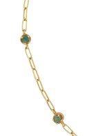 Gold tennis necklace with sparkling chain and pendant, stylish jewelry piece by Fenomena displayed on a white background.
