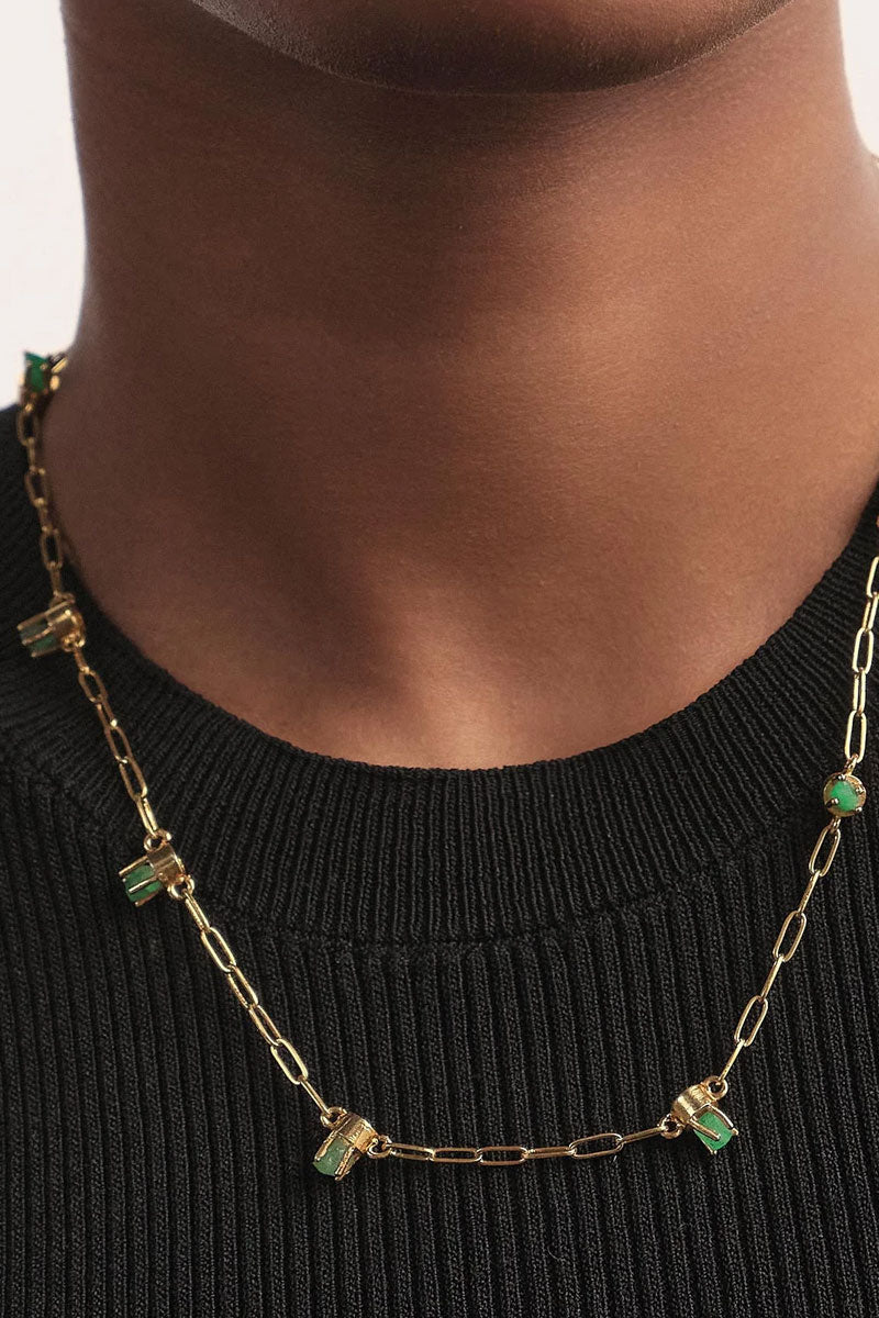 Gold GEO Emerald Earrings by Fenomena featuring elegant emerald gemstones in classic earring design