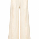 Yellow Terra pants by Ana + Maria displayed on a ghost mannequin, showcasing their relaxed fit and vibrant butter yellow color.
